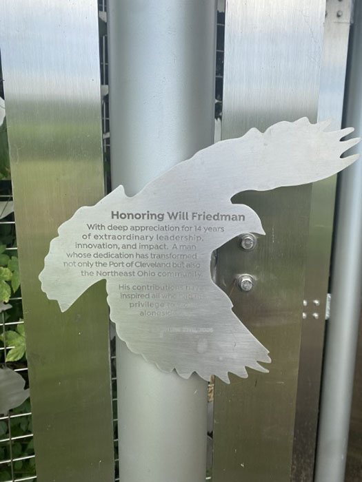 A plaque dedicates the gate to Will Friedman, retired president and CEO of the Port of Cleveland.